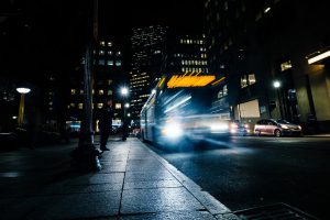 bus on night lighted street