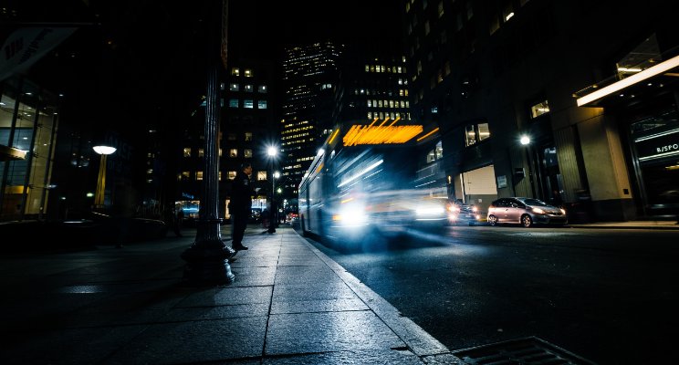 bus on night lighted street