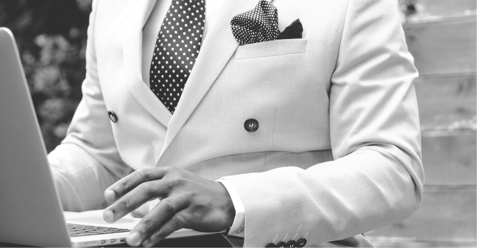 man typing on computer