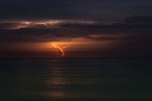 lightning over water